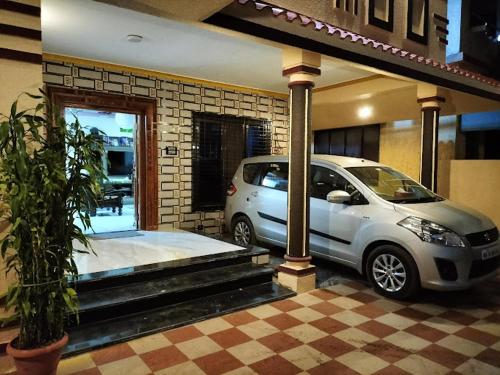 a car parked in front of a house at Bethel House Holiday Stay-inn in Alibaug