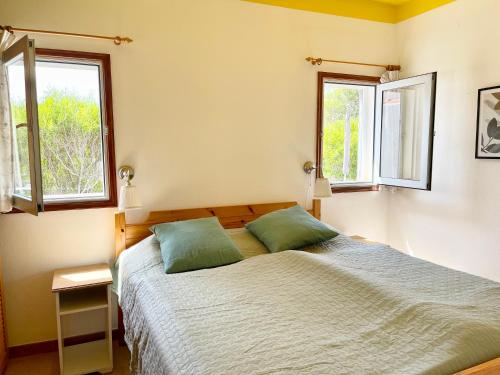 Postel nebo postele na pokoji v ubytování Casa Mira, Ruhiger Bungalow in Las Norias