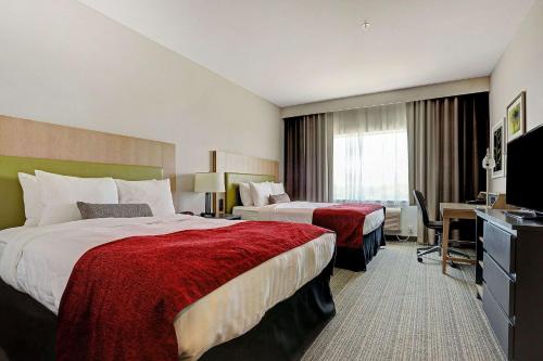Katil atau katil-katil dalam bilik di Ramada by Wyndham Houston Westchase