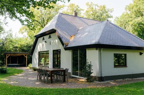 Giardino di Van der Valk Hotel Apeldoorn - de Cantharel
