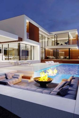 a living room with a pool and a house at Total confort in Porto Alegre