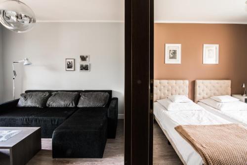 Posteľ alebo postele v izbe v ubytovaní Apartamenty Algador