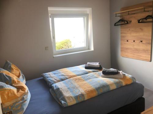 Ένα ή περισσότερα κρεβάτια σε δωμάτιο στο Appartement Pohl