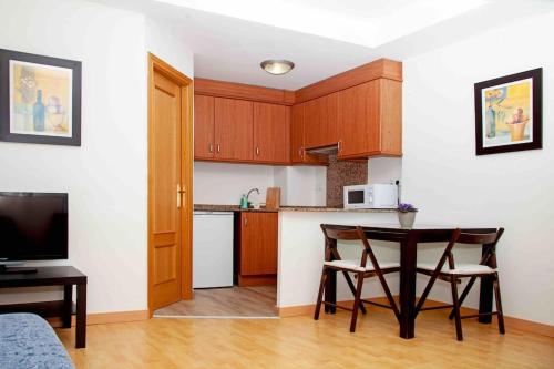 O bucătărie sau chicinetă la A studio-apartment in a newly built house.WIFI