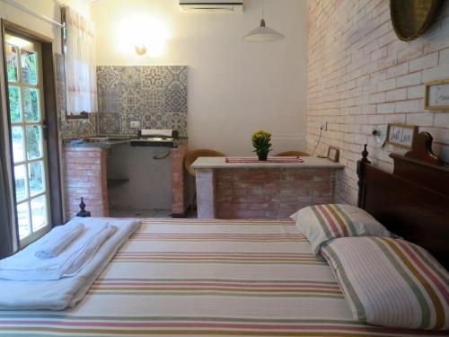 Postel nebo postele na pokoji v ubytování Chalé na Cachoeira