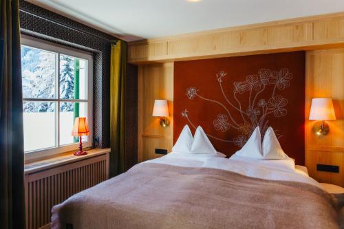 Ліжко або ліжка в номері Boutique-Hotel Schmelzhof