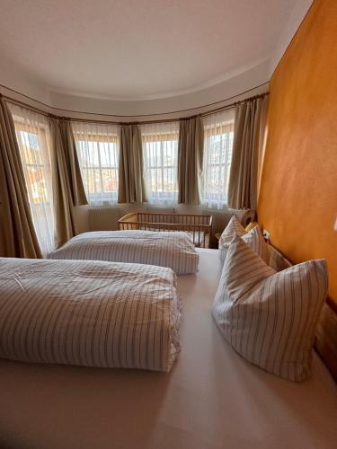 Postel nebo postele na pokoji v ubytování Villa Marianne