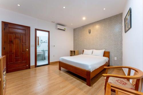 Llit o llits en una habitació de Cucumber Hostel