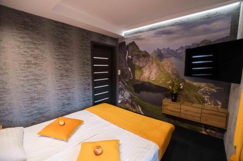 Кровать или кровати в номере Apartments in Bukowina