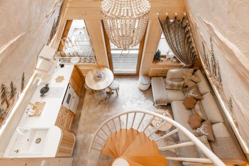 an overhead view of a living room with a staircase at Brzozowa Osada - Premium Chalets Zakopane in Zakopane