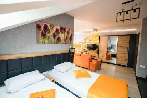 Кровать или кровати в номере Apartments in Bukowina