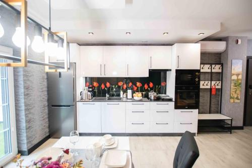 Кухня или мини-кухня в Apartments in Bukowina
