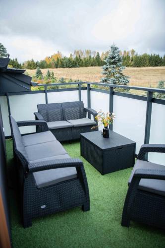 Гостиная зона в Apartments in Bukowina