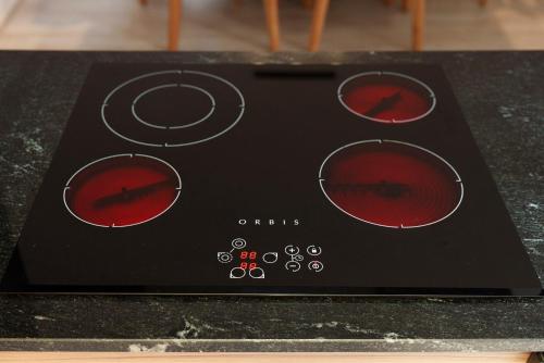 a black box with red eyes on a table at Cabañas Tierra Mistica in Ushuaia