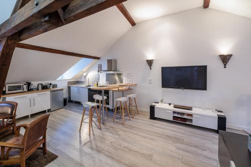 Kuchyňa alebo kuchynka v ubytovaní Résidence Leclerc - Appartements d'hôtes - Secteur thermal