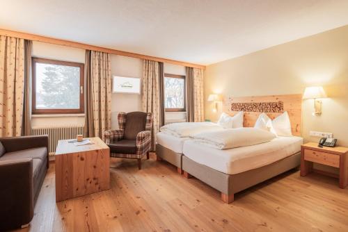 Postel nebo postele na pokoji v ubytování Biohotel Leutascherhof