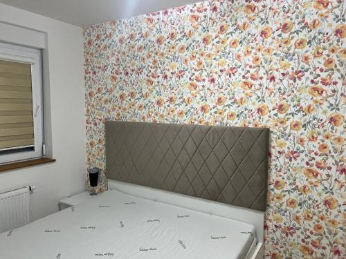 Postel nebo postele na pokoji v ubytování Apartman Mihajlo