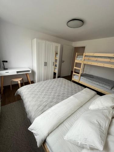 Sáňky Apartmányにあるベッド