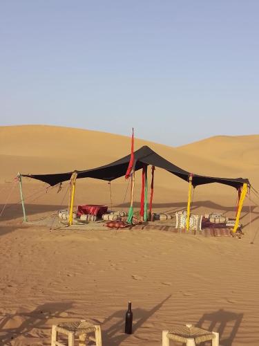 a tent in the middle of the desert at Itri camp in Zagora