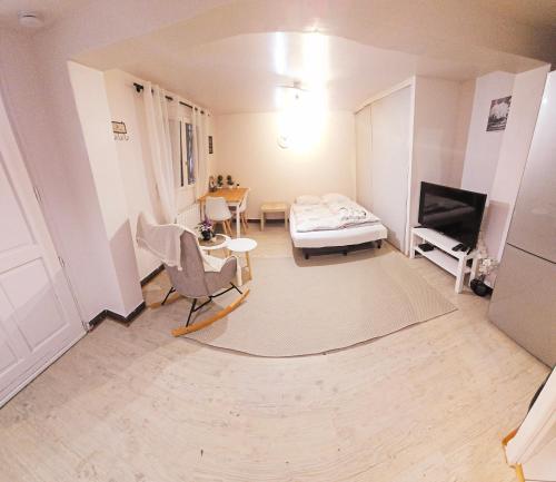 Et tv og/eller underholdning på Appartement à proximité de la Gare du RER B Le Guichet ,Paris Saclay