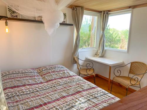 En eller flere senge i et værelse på Luna roja