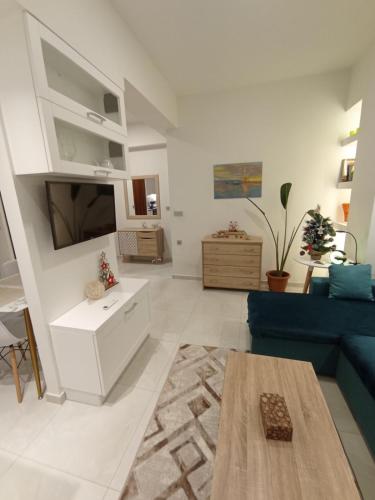 Ruang duduk di Ethereum City Αpartment - Suite