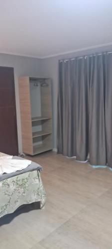 Cama o camas de una habitación en Pousada Canoa dos Anjos suítes