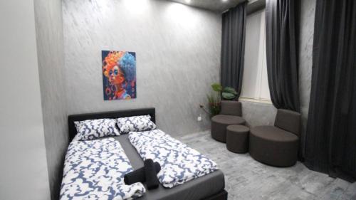 Postel nebo postele na pokoji v ubytování Family Studio in AKH Area
