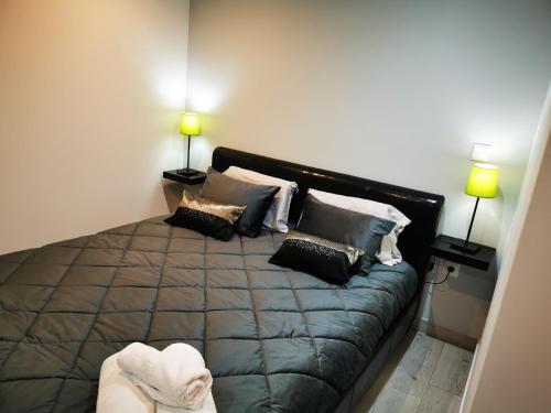 מיטה או מיטות בחדר ב-Casa dos Carvalhinhos