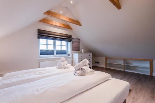 Ένα ή περισσότερα κρεβάτια σε δωμάτιο στο Appartement Wattside
