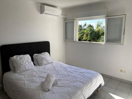 Voodi või voodid majutusasutuse Appartement T2 Chic - vue mer et montagne toas