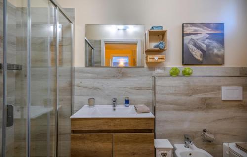 a bathroom with a sink and a shower at Beautiful Home In Marotta With Kitchen in Marotta