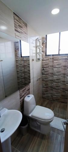 Ένα μπάνιο στο Apartamento para descansar 3