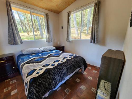 Postel nebo postele na pokoji v ubytování Chalet Bosque de Zacatlan II