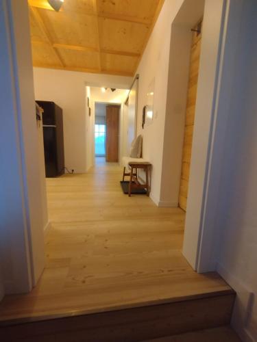 a hallway in a house with a wooden floor at Ferienwohnung Bergzauber Krün in Krün