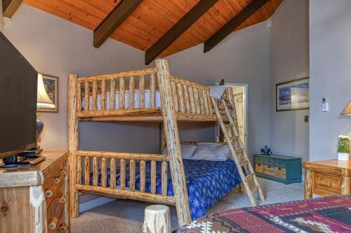 a bedroom with a bunk bed and a ladder at Retreat to Paradise in Arnold