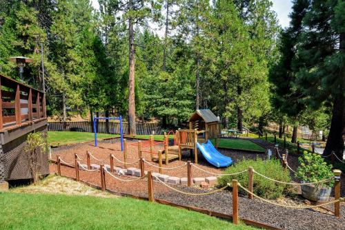 a playground in a park with a slide at Retreat to Paradise in Arnold