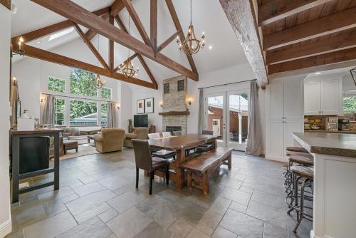 a kitchen and living room with a table and a dining room at Yellowdog Inn in Arnold