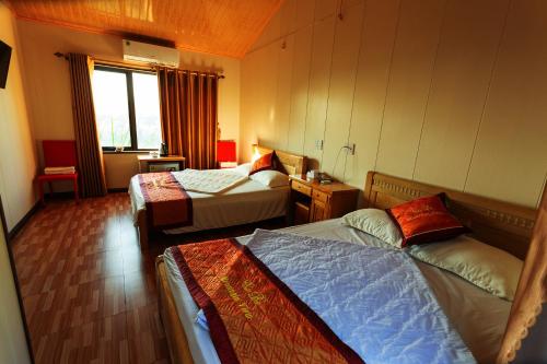 Katil atau katil-katil dalam bilik di Cat Ba Mountain View Homestay