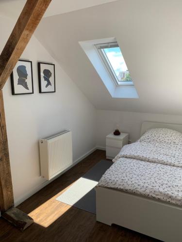 Postel nebo postele na pokoji v ubytování Apartement Lujzi