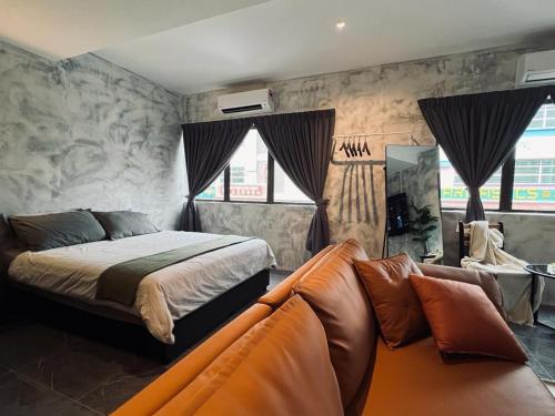 Ένα ή περισσότερα κρεβάτια σε δωμάτιο στο The Ash Ipoh - Family Suite