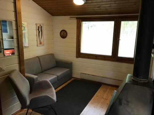 Ein Sitzbereich in der Unterkunft Lomariihi 2