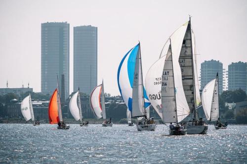 a group of sailboats in a body of water at Botnia Mini Racer in Rīga