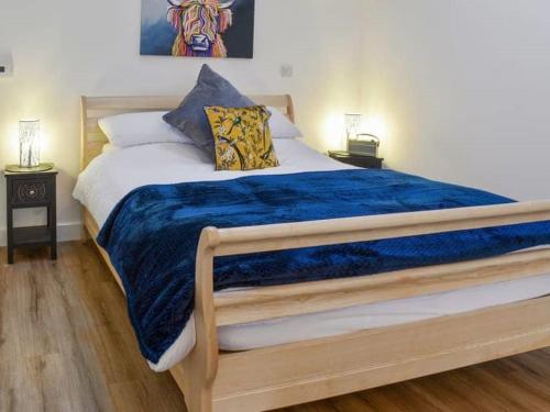Ένα ή περισσότερα κρεβάτια σε δωμάτιο στο Blundens Holiday Lets - Ffos Las