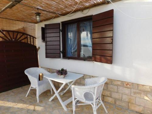 Balkon atau teras di Holiday House Rivi