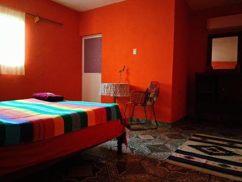 Кровать или кровати в номере Casa Águila