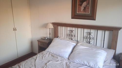 A bed or beds in a room at Casa Parque de Mayo