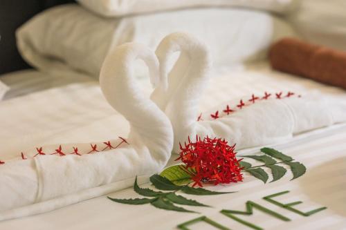 Una cama o camas en una habitación de Vegas Thoddoo Maldives