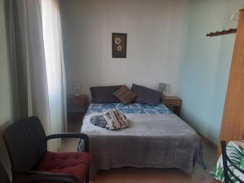 Postel nebo postele na pokoji v ubytování COMPLEJO DEPARTAMENTOS BePe FRENTE AL MAR