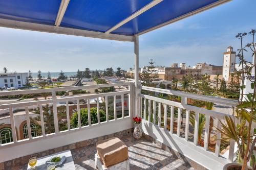 a balcony with a view of the city at Chems Bleu in Essaouira
